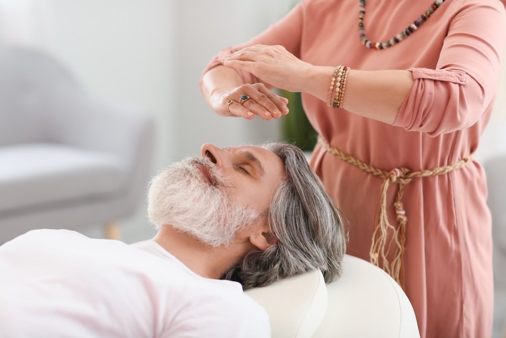 man-receiving-types-of-reiki.jpg